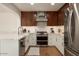 Renovated kitchen, stainless steel appliances, hardwood floors at 2301 E Osborn Rd, Phoenix, AZ 85016