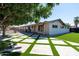 Charming single story home with landscaped yard and walkway at 2301 E Osborn Rd, Phoenix, AZ 85016