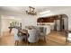 Bright dining area with rustic table and chandelier at 2301 E Osborn Rd, Phoenix, AZ 85016