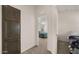 Hallway with access to two bedrooms and linen closet at 9333 E University Dr # 45, Mesa, AZ 85207