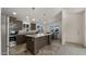 Kitchen features island, stainless steel appliances, and ample counter space at 9333 E University Dr # 45, Mesa, AZ 85207