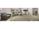 Spacious living room with sectional sofa and TV at 9333 E University Dr # 45, Mesa, AZ 85207