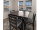 Bright dining area with a four-person table and chairs at 9333 E University Dr # 45, Mesa, AZ 85207