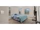 Spacious bedroom with large windows and a TV at 9333 E University Dr # 45, Mesa, AZ 85207