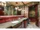 Luxurious bathroom with double vanity and marble finishes at 8100 N 68Th St, Paradise Valley, AZ 85253