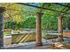 Landscaped garden with raised planters under pergola at 8100 N 68Th St, Paradise Valley, AZ 85253