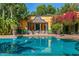Inviting pool with a charming building in the background at 8100 N 68Th St, Paradise Valley, AZ 85253