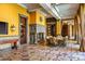 Outdoor patio with fireplace, seating area, and pool view at 8100 N 68Th St, Paradise Valley, AZ 85253