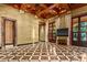 Living area with large screen TV and access to patio at 8100 N 68Th St, Paradise Valley, AZ 85253