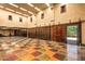 Spacious interior garage with tiled floor and multiple doors at 8100 N 68Th St, Paradise Valley, AZ 85253