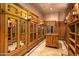 Large walk-in closet with ample shelving and mirror doors at 8100 N 68Th St, Paradise Valley, AZ 85253