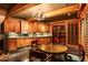 Charming basement kitchen with wooden cabinets and granite countertops at 8100 N 68Th St, Paradise Valley, AZ 85253