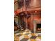 Impressive spiral staircase with ornate metal railing and wood accents at 8100 N 68Th St, Paradise Valley, AZ 85253