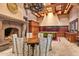 Kitchen with a dining area and fireplace at 8100 N 68Th St, Paradise Valley, AZ 85253
