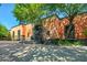 Spanish-style home with large wooden doors and lush landscaping at 8100 N 68Th St, Paradise Valley, AZ 85253