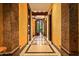 Grand hallway with marble flooring and access to other rooms at 8100 N 68Th St, Paradise Valley, AZ 85253