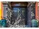 Ornate dark wood double doors with iron accents at 8100 N 68Th St, Paradise Valley, AZ 85253