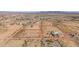 Aerial view of property with lot lines; view of neighborhood at 50910 W Long Rifle Rd, Aguila, AZ 85320