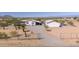 Home with detached garage and desert landscaping at 50910 W Long Rifle Rd, Aguila, AZ 85320