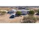 Property features two mobile homes, RV parking, and a large yard at 50910 W Long Rifle Rd, Aguila, AZ 85320