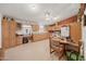 Bright kitchen with ample cabinetry and counter space at 50910 W Long Rifle Rd, Aguila, AZ 85320
