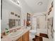 Bathroom with tub, toilet and vanity at 50910 W Long Rifle Rd, Aguila, AZ 85320