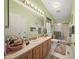 Clean bathroom with shower, toilet and vanity at 50910 W Long Rifle Rd, Aguila, AZ 85320