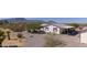 Mobile home with covered patio and mountain views at 50910 W Long Rifle Rd, Aguila, AZ 85320