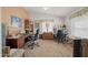 Home office with two desks and ample storage at 50910 W Long Rifle Rd, Aguila, AZ 85320