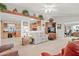 Spacious living room with a view into the kitchen at 50910 W Long Rifle Rd, Aguila, AZ 85320