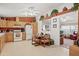 Kitchen features wood cabinets and a breakfast nook at 50910 W Long Rifle Rd, Aguila, AZ 85320