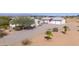 Home with detached garage; gravel driveway; desert setting at 50910 W Long Rifle Rd, Aguila, AZ 85320