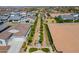 Aerial view of neighborhood with tree-lined walkway and homes at 11129 E Ulysses Ave, Mesa, AZ 85212