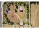 Aerial view showing playground with play structures, swings, and shaded seating areas at 11129 E Ulysses Ave, Mesa, AZ 85212