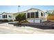 Mobile home exterior view with landscaping at 7750 E Broadway Rd # 24, Mesa, AZ 85208