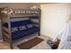 Bunk beds and a futon in a charming bedroom with a teepee at 2716 W Adventure Dr, Anthem, AZ 85086