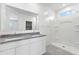 Bathroom boasts double vanity and a large walk-in shower at 38155 W Excussare Way, Maricopa, AZ 85138