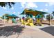 Playground with shade structures and play equipment for  at 38155 W Excussare Way, Maricopa, AZ 85138
