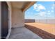 Covered patio with access to backyard at 38155 W Excussare Way, Maricopa, AZ 85138