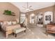 Main bedroom with high ceilings, a sitting area, and large windows at 6907 E Teton Cir, Mesa, AZ 85207