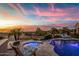 Inviting pool and spa with sunset views at 6907 E Teton Cir, Mesa, AZ 85207