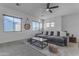 Sitting room with gray sectional sofa and coffee table at 964 W Saguaro Ln, San Tan Valley, AZ 85143