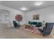 Bright and airy living room featuring comfortable seating and stylish decor at 964 W Saguaro Ln, San Tan Valley, AZ 85143