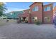 Two-story home with a covered patio and gravel backyard at 964 W Saguaro Ln, San Tan Valley, AZ 85143