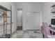 Spacious bedroom with double doors leading to another room at 964 W Saguaro Ln, San Tan Valley, AZ 85143