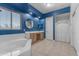 Elegant bathroom with double sinks, a soaking tub, and a shower at 964 W Saguaro Ln, San Tan Valley, AZ 85143
