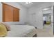 Comfortable bedroom with a view and access to another room at 964 W Saguaro Ln, San Tan Valley, AZ 85143