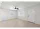 Bright living room with tile floors and ceiling fan at 2031 E Don Carlos Ave, Tempe, AZ 85281