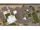 Bird's-eye view of a luxury estate with pool, sports court, and ample grounds at 5704 N Wilkinson Rd, Paradise Valley, AZ 85253