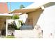 Outdoor kitchen area with built-in grill and retractable awning at 7232 E Maverick Rd, Scottsdale, AZ 85258